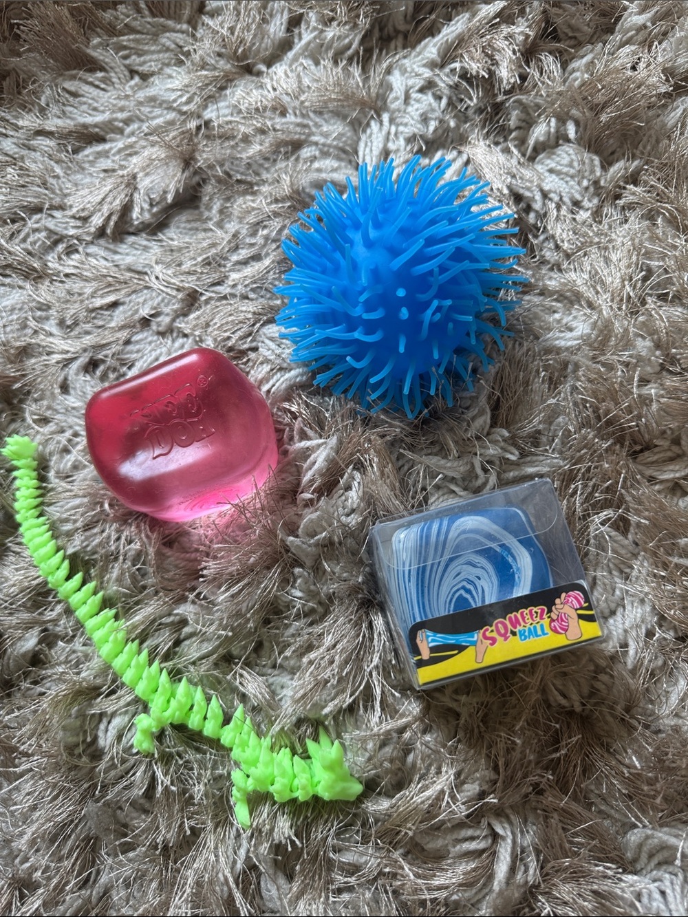 Kids Blue Spiky Sensory Play Ball - Squeezy Ball glow in the dark